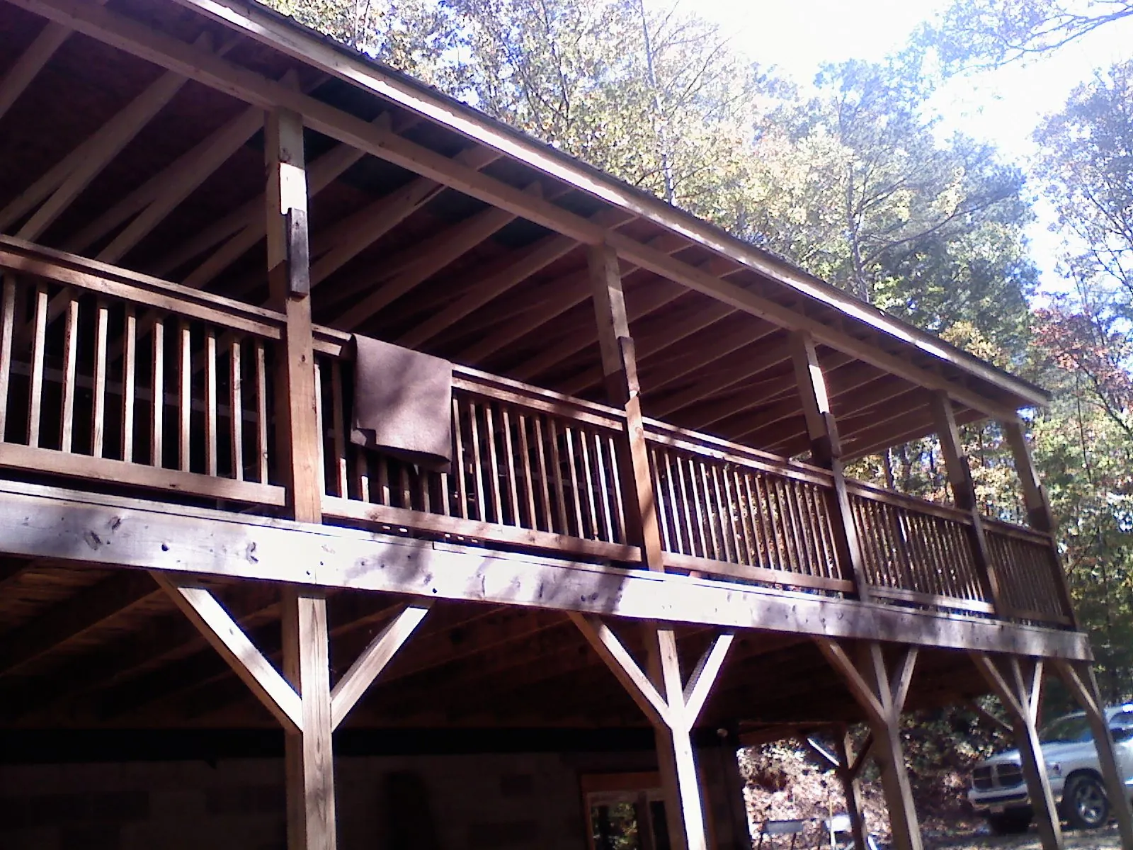 Timber framing under a new elevated porch and deck — Roof Leak Repair in Foxboro by Roofing Brothers